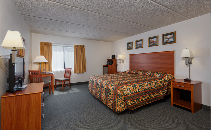 large hotel room with king bed